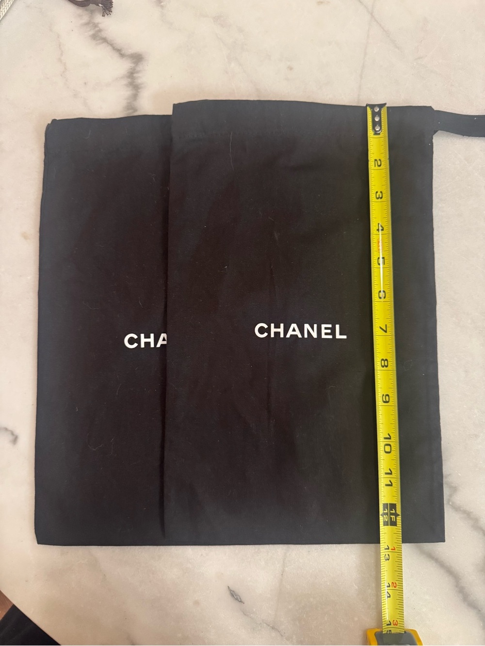 Two Chanel dustbags 13” x 8”